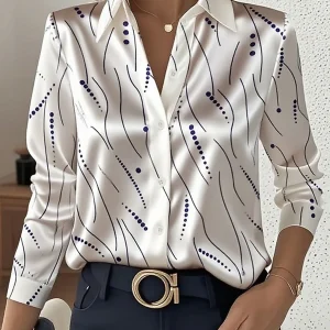 Chemisier satiné à motifs abstraits ondulés