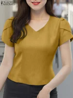 Blouse à manches bouffantes, col en V e.