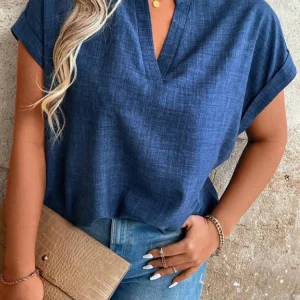 Blouse pour femme, manches chauve-souris.