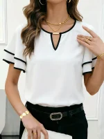 Chemisier pour femme couleur uni .